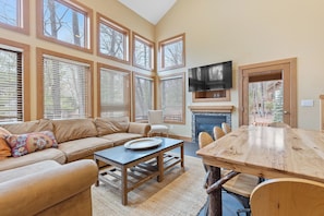 Living Room - Plenty of seating, great natural light and flat screen tv with gas fireplace.