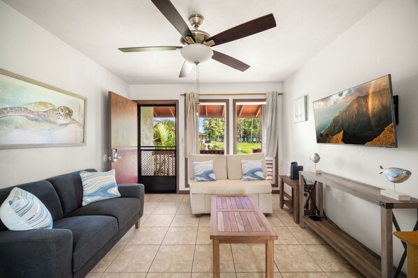 Living area with distant ocean views and cable tv