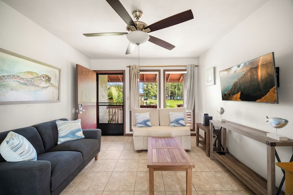 Living area with distant ocean views and cable tv