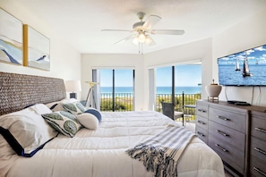 Main Bedroom with Beach views and access to Balcony.