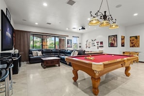 View of living area showcases our billiard table for your entertainment