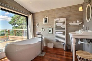 A charming bathroom with a view!
