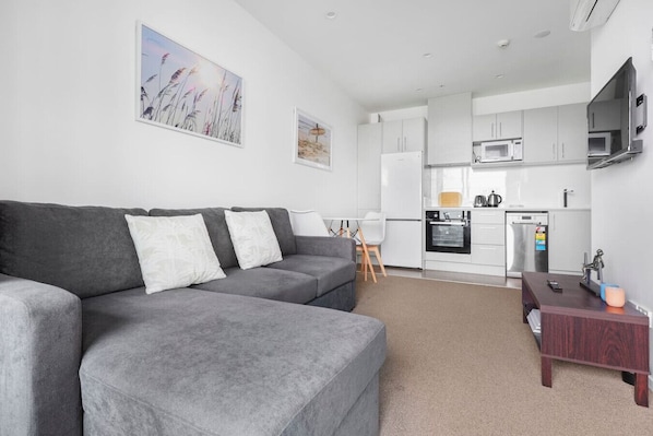 Open-plan living, dining and kitchen area.