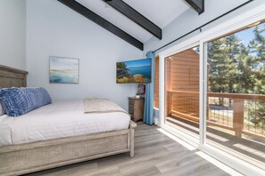Bedroom 1: King bed, private balcony, TV with Roku 4K streaming & dedicate workspace (shown later)
