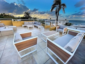 Shared Rooftop with Lounge chairs and Ocean views (2)