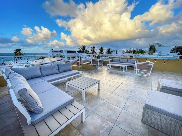 Shared Rooftop with Lounge chairs and Ocean views (1)