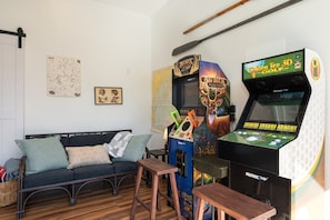 Two arcade games for fun family competition - Big Buck Hunter and Golden Tee