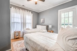 Left Unit - Bedroom with large windows