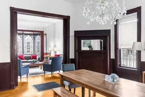 First dining table with view of first living room.