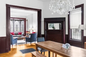 First dining table with view of first living room.