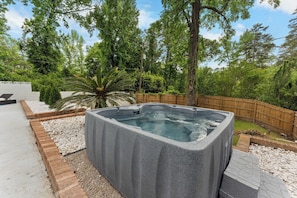 The jacuzzi beckons with the soft hum of bubbling water and the promise of total relaxation.