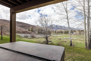 The private hot tub on the lower deck is the ideal place to relax and recharge after a day on the slopes or out adventuring.