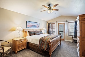 - Sink into a plush comfortable king size bed with bold Southwestern patterns and soft lighting
- Wake up to natural light pouring through French doors and forest views
- Enjoy the rustic charm of log style furniture and mountain lodge vibes