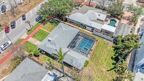 Welcome Home!  Aerial view of home. Screened pool and patio, back yard and more - Fun Fun Fun!
