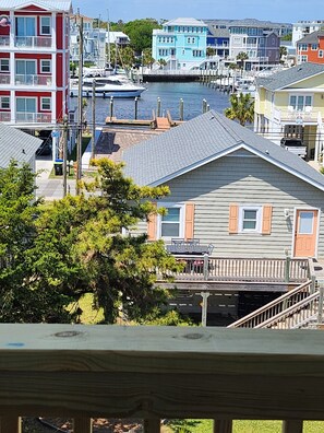 Harbor view from the rear covered balcony off of the master bedroom. 
