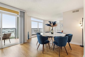 Dining Area with View - Dine in style with sweeping balcony views