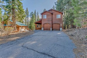 Exterior: On-site parking for 5 cars (1 in garage, 4 in driveway)