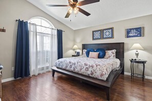 Bright and comfortable master bedroom at the front of the home, featuring an ensuite bathroom and a Smart TV for relaxing evenings.