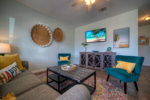 Unwind in the cozy living room. (Unit 103)