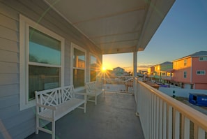 Balcony spot, sunset hour.