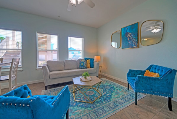 Inviting living room features a sleep sofa for additional guests (Unit 102)