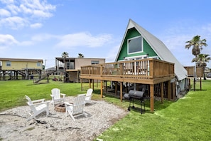The yard is fully fenced-in— perfect for pets and small kids