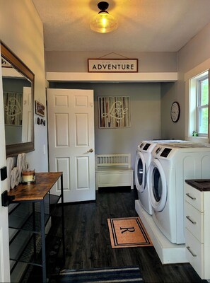 Laundry room located upstairs and available for use.