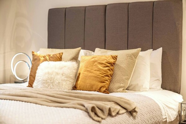 Indulge in the ultimate comfort and luxury of our spacious room, featuring a lavish king size bed that invites you to unwind, rest and rejuvenate.