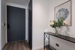 Welcome to your stylish retreat with a modern entrance that sets the tone for a relaxing stay.