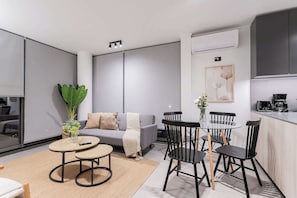 Chic and cozy living space with modern amenities, perfect for relaxing or entertaining in style.