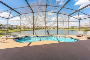 Relax in this beautiful pool area with a lake view and create memories that will last a lifetime with your loved ones.