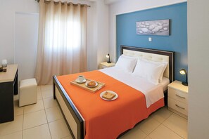 Rest easy in a cozy double bed, freshly prepared with crisp linens and soft lighting