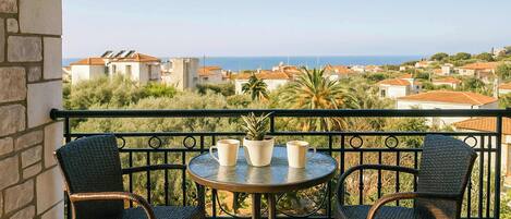 Enjoy your morning coffee with breathtaking sea views and the soothing sound of nature from your private balcony