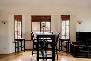 Dinette with bay window views.