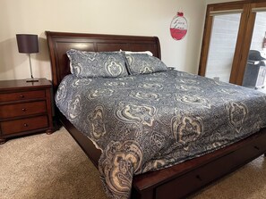 King master bedroom with door to deck