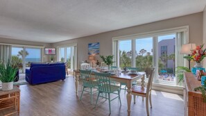 Bright + Breezy Living Room with Pool Views & Direct Oceanfront Balcony