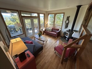 Wood burning fireplace? Access to your first deck? what could be more cozy?