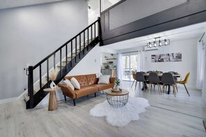 The open layout connects the living and dining areas, making it easy to relax, dine, and entertain.
