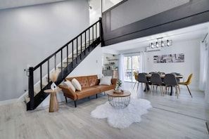 The open layout connects the living and dining areas, making it easy to relax, dine, and entertain.