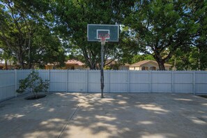 Enjoy a friendly pickup game with family on our private basket ball half court.