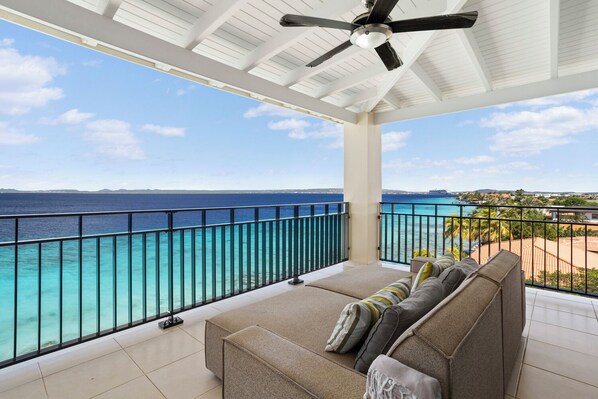 Top floor tranquility, steps from the sand

