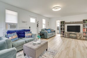 Living Room | Queen Murphy Bed | Twin Sleeper Chair | Smart TV