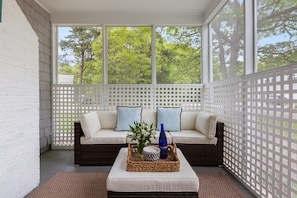 Our screened outdoor space offers the best of fresh air with none of the pesky bugs!
