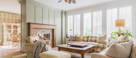 Cozy up by the warm fireplace in this inviting lounge.