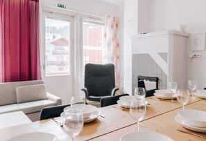 The apartment's furnishings have been recently updated. The dining area can easily accommodate the whole family for breakfast or dinner.