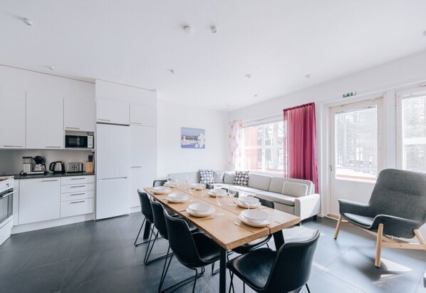 The apartment's furnishings have been recently updated. The dining area can easily accommodate the whole family for breakfast or dinner.