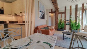 Le Normandie - Kitchen,dining and seating area