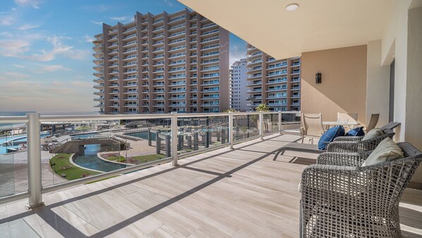 Grand balcony with the resort grounds outside.