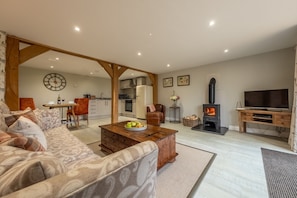 The Woodshed at Green Valley Farm, Ubbeston: Open plan living space with wood burning stove
