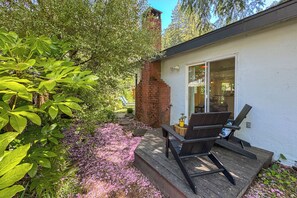 A small private deck offers an intimate spot for two, - perfect for morning coffee